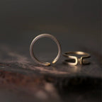 Two views of the double band copper ring showing the open adjustable gap