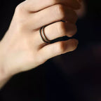 Double band copper ring worn on the middle finger