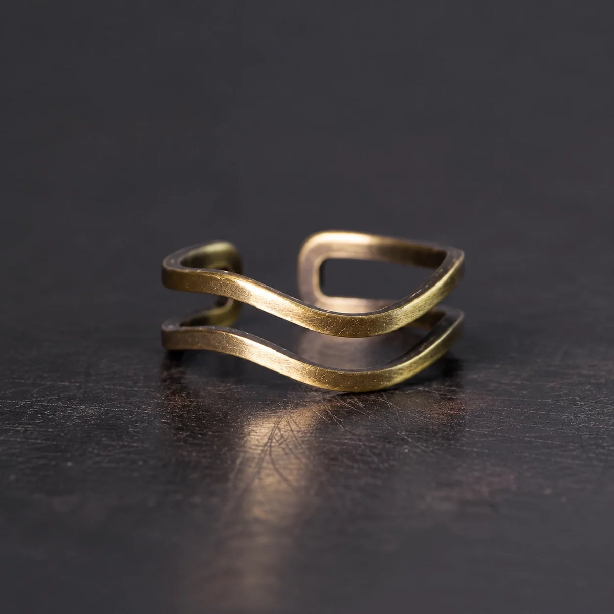 Angled view of the double wave adjustable copper ring