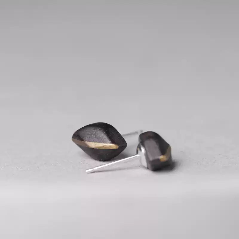 Ebony wood stud earrings showing the earring posts