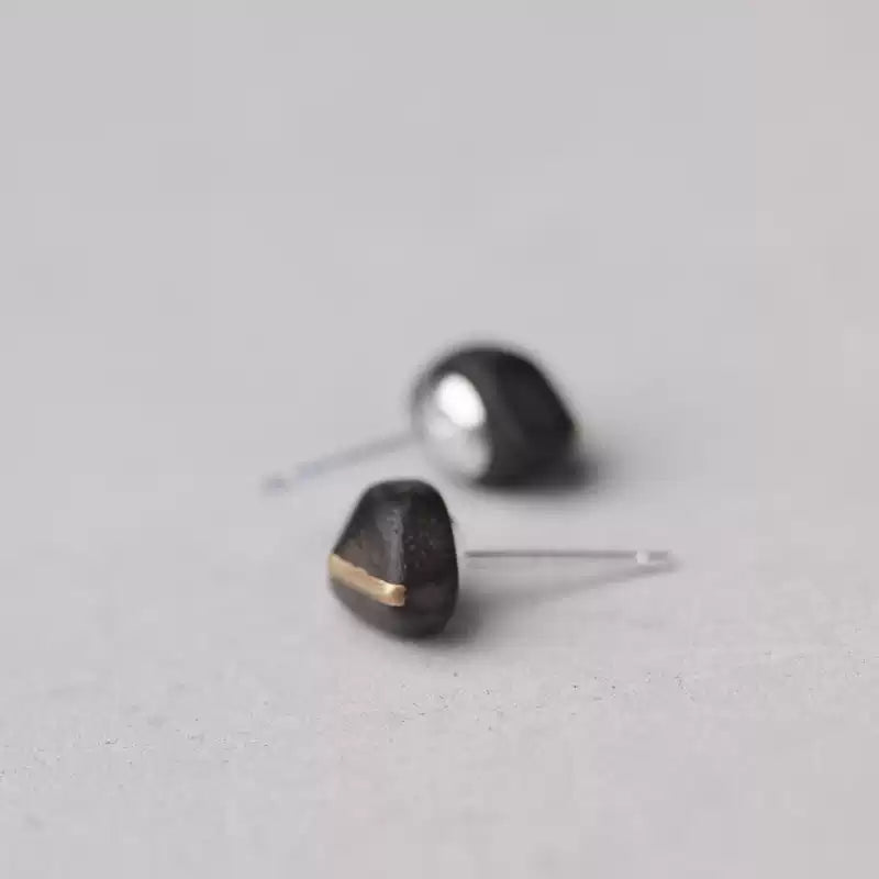 Back view of ebony stud earrings with metal posts