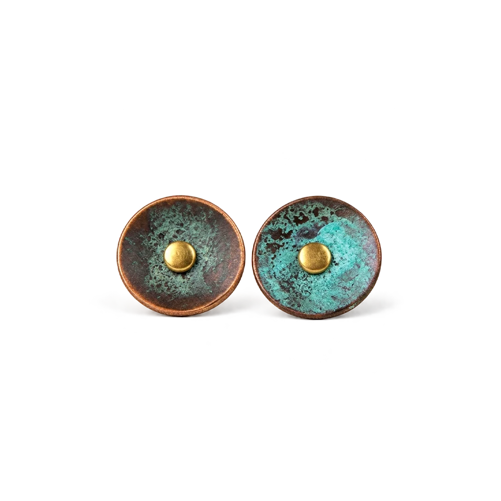Pair of round verdigris patina copper disc stud earrings with a domed copper center, white background
