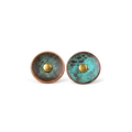 Pair of round verdigris patina copper disc stud earrings with a domed copper center, white background