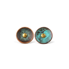 Pair of round verdigris patina copper disc stud earrings with a domed copper center, white background