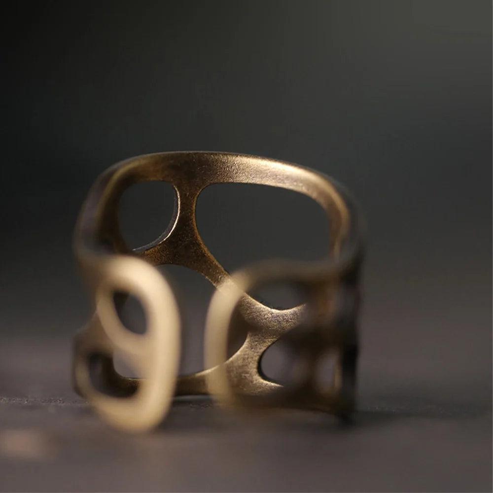Front view of the open-back adjustable copper ring and its cutout design