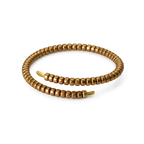 Coiled copper wrap bracelet made of segmented copper beads with flat tapered ends, white background