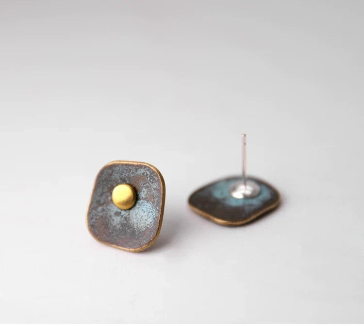 Square patina copper stud earring shown front and back with post