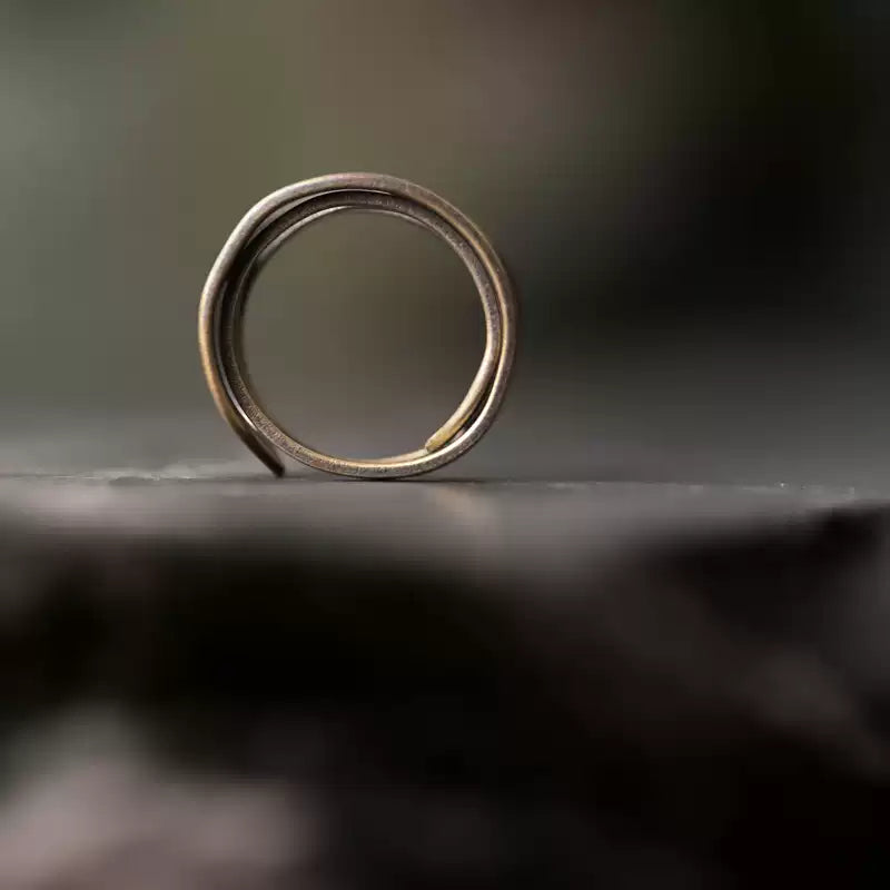 Profile of the copper ring showing its adjustable open coil shape