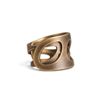 Wide copper ring with crossing oval cutouts and an adjustable open band, white background