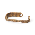Wire-wrapped copper cuff bracelet with a twisted open shape and looped ends, white background
